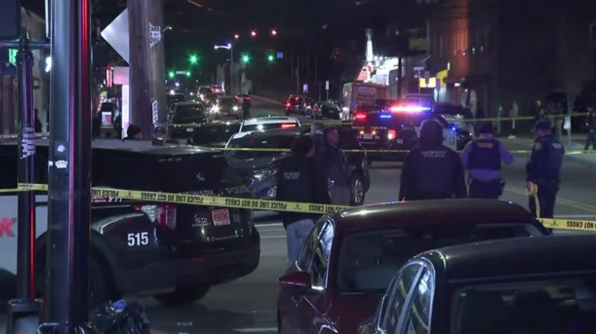 Una Comunidad de Luto: Adulto y Niño Muertos, Tres Heridos en Tiroteo de Newark